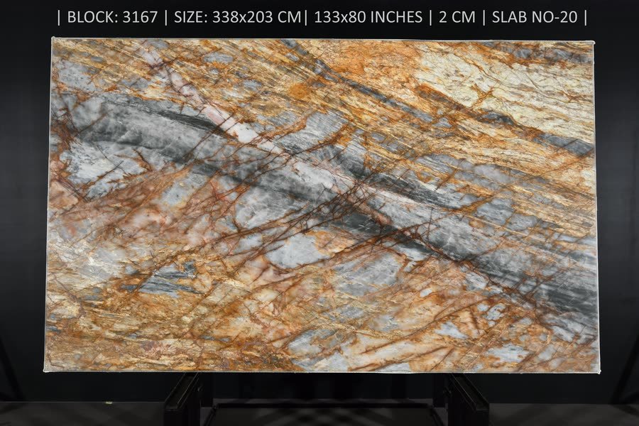 A full stone slab photographed square-on against a black studio background, its grey and cream field crossed by rust-orange and deep red veining. A line of white inventory text runs along the top edge of the image.